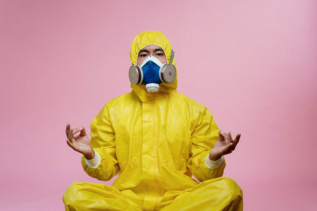 Man In Yellow Safety Suit With Mask Eyes Open